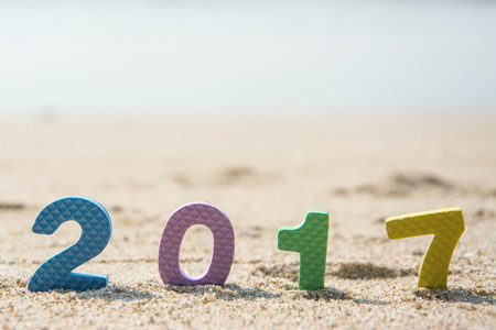 New Year 2017 concept ,text on the beach sandの写真素材