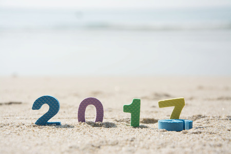 New Year 2017 concept ,text on the beach sandの写真素材