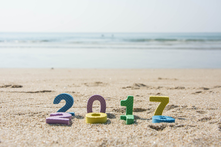 New Year 2017 concept ,text on the beach sandの写真素材
