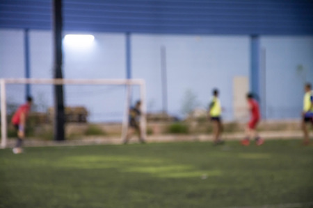 Blurred image of a football field, use for background.の写真素材