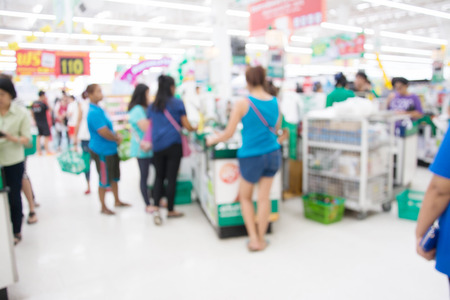 blur image of supermarket store ,Cashier counter with customerの写真素材