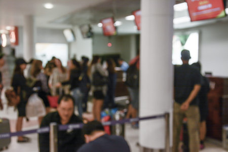 Abstract blur image of people walk in the airport
