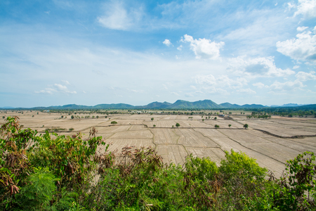 rice feild and village near Wat Tham Sua(Tiger Cave Temple) ,Top view from the Wat Tham Sua(Tiger Cave Temple),  Kanchanburi, Thailandの写真素材