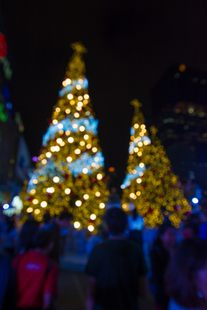 abstract blurred   background of people walk with christmas  lightingの写真素材