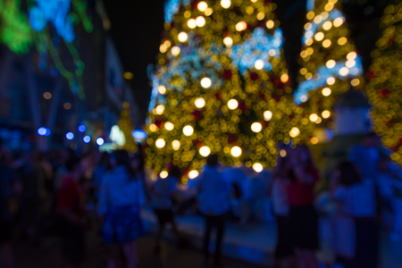 abstract blurred   background of people walk with christmas  lightingの写真素材