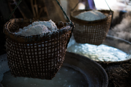 raditional salt making by boiling underground salt water from natural rocksalt pond in  Bo Kluea village. Nan province, Thailand.の写真素材