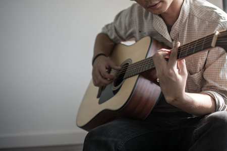 musician playing the guitar