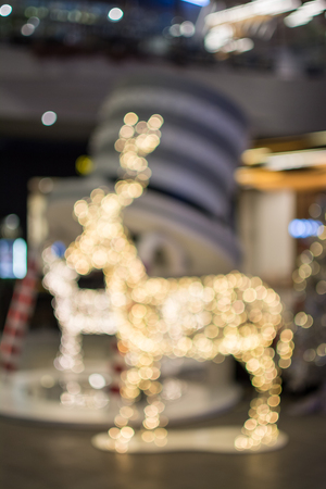 Reindeer Christmas background,  golden of bokeh backgroundの写真素材