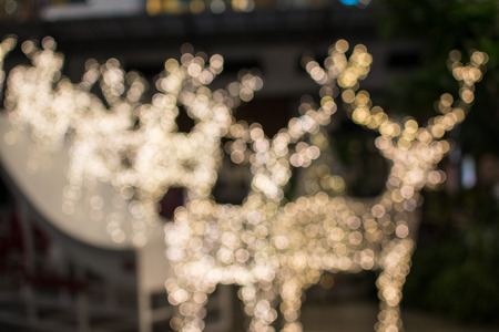 Reindeer Christmas background,  golden of bokeh backgroundの写真素材