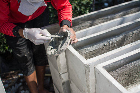 man made rectangular  concrete pots for plants