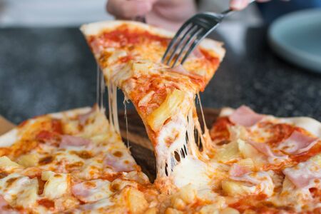 Pizza Carbonare with pineapple, beconの写真素材
