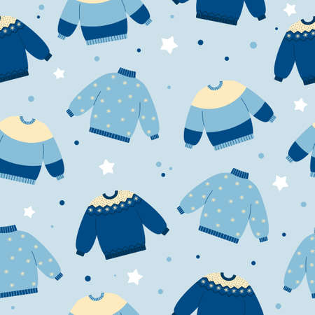 Seamless pattern of warm sweaters in blue colors on blue background. Winter or autumn clothing background. Doodle style. Christmas holidays mood. Vector illustrationのイラスト素材