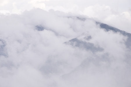 Cloudy skies from the mountainの写真素材