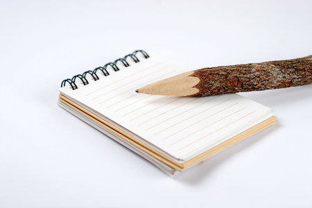 Natural Wooden Pencil on notebookの写真素材