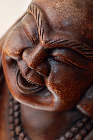Portrait of Wooden Buddha statueの写真素材