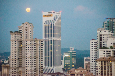 Kuala Lumpur skyline at sunrise with a moonのeditorial素材