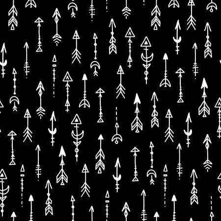 Vector seamless handdrawn black pattern in boho style with ethnic decoration. Bohemian chic trendy arrows vector ornament.の写真素材