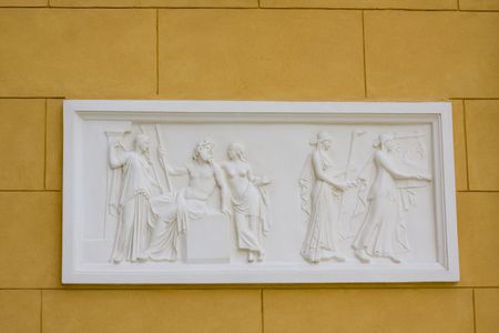 white bas-relief on a peach wallの写真素材