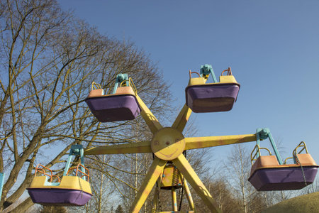 Childrens carousel in Central Park in the summer, Ternopil, Ukraine