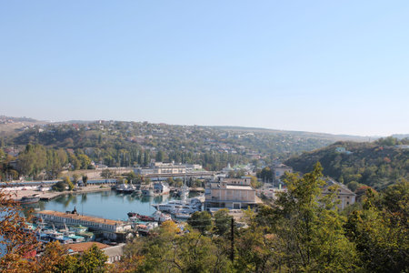 Ships among the hills are in the harbor, summer day in the Crimeaの写真素材