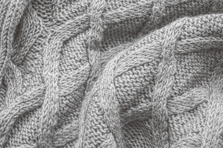 Organic knit background with macro woven threads.