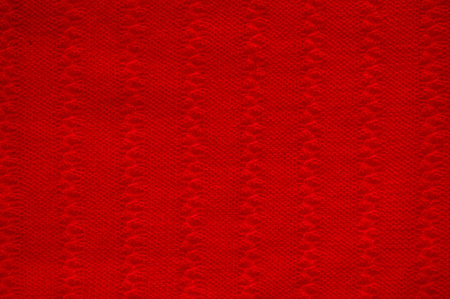 Organic knitted material with macro weave threads.