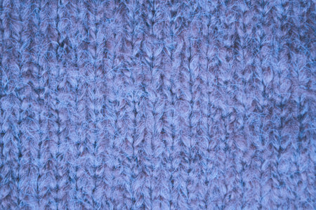 Organic knitting material with macro wool threads.