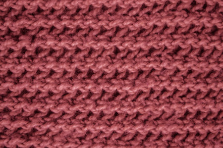 Handmade knit texture with macro woven threads.