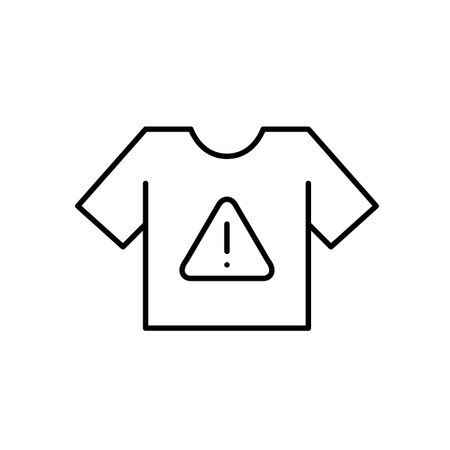 Tshirt and hazard alert with exclamation mark. Clothing safety warnings. Flammability or harmful dyes. Pixel perfect, editable stroke vector iconのイラスト素材