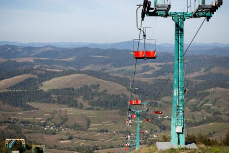 View from the chairlift ride to mountains with beautiful nature background. Ukrainian Carpathiansの写真素材