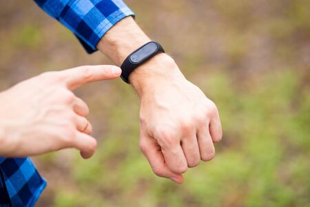 Person using smart watch. Young man use smart watch computer device, smartwatch close upの写真素材