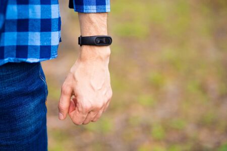 Person using smart watch. Young man use smart watch computer device, smartwatch close upの写真素材