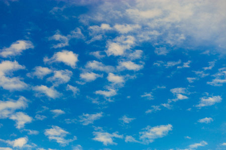 blue sky background with tiny clouds on sunny day