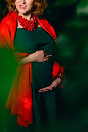 Pregnancy, the hands of a woman on his stomachの写真素材