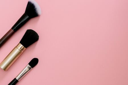 makeup brush under different angles on a pink backgroundの写真素材