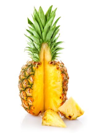fresh ananas fruit with cut isolated on white backgroundの写真素材
