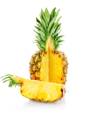 ripe ananas with cut  isolated on white backgroundの写真素材