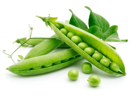 fresh pea fruit with green leaf isolated on white backgroundの写真素材