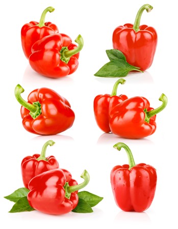 set fresh pepper fruits with green leaves isolated on white backgroundの写真素材