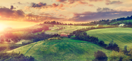 Picturesque sunset over green hills sunshine Italy dramatic sky cloud panorama landscape. Bologna. Tuscany. Picturesque sunset over green hills sunshine Italy dramatic sky cloud panorama landscape. Bologna. Tuscany.