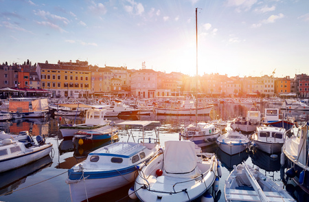 Motorboats and boats on water in port of Rovinj.の写真素材