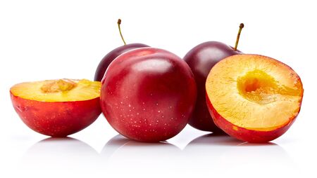 Fresh plum in cut. Fruity still life. Healthy food. Isolated on white background.の写真素材