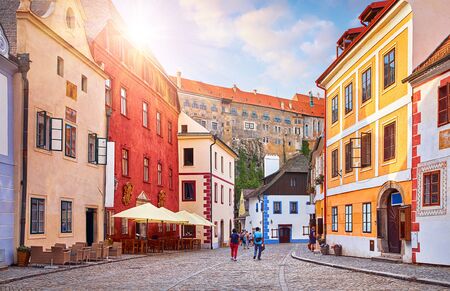 Cesky Krumlov, Czech Republic. Ancient street with old houses. Evening sunset with sunlight.の写真素材