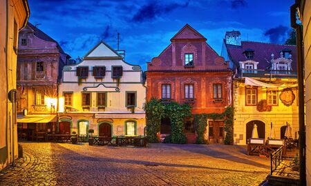 Cesky krumlov, Czech Republic Square with traditional decorative houses. Nighttime street with blue sky.の写真素材