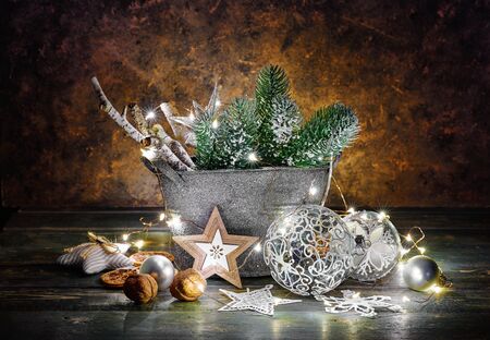 Christmas holiday decoration with fir, balls and garland.の写真素材