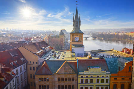 Prague Czech Republic. View at old town from tower at Charles Bridge. Picturesque landscape. Panorama landmark with broach and sculptures at cathedral. Red tegular roof of Europe.の写真素材