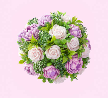 Bunch white and purple roses at pink background. Top view.の写真素材