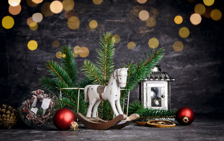 Christmas card with vintage wooden horse decoration for christmas tree at old boardの写真素材