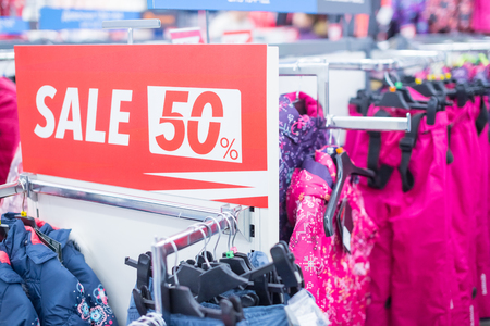 Sale sign in winter clothes shop.shopping and discount concept. Final Sale Sign In A Clothing Store Selective focus.shopping and discount concept.の写真素材