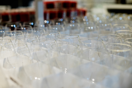 group of glass, setup for wedding ceremony. selective focus.catering service.clean glasses standing on table Clean, dry, transparent glasses stand in a rowの写真素材